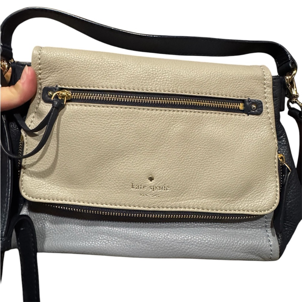 Kate Spade excellent used condition;  fold over bag. Very nice!